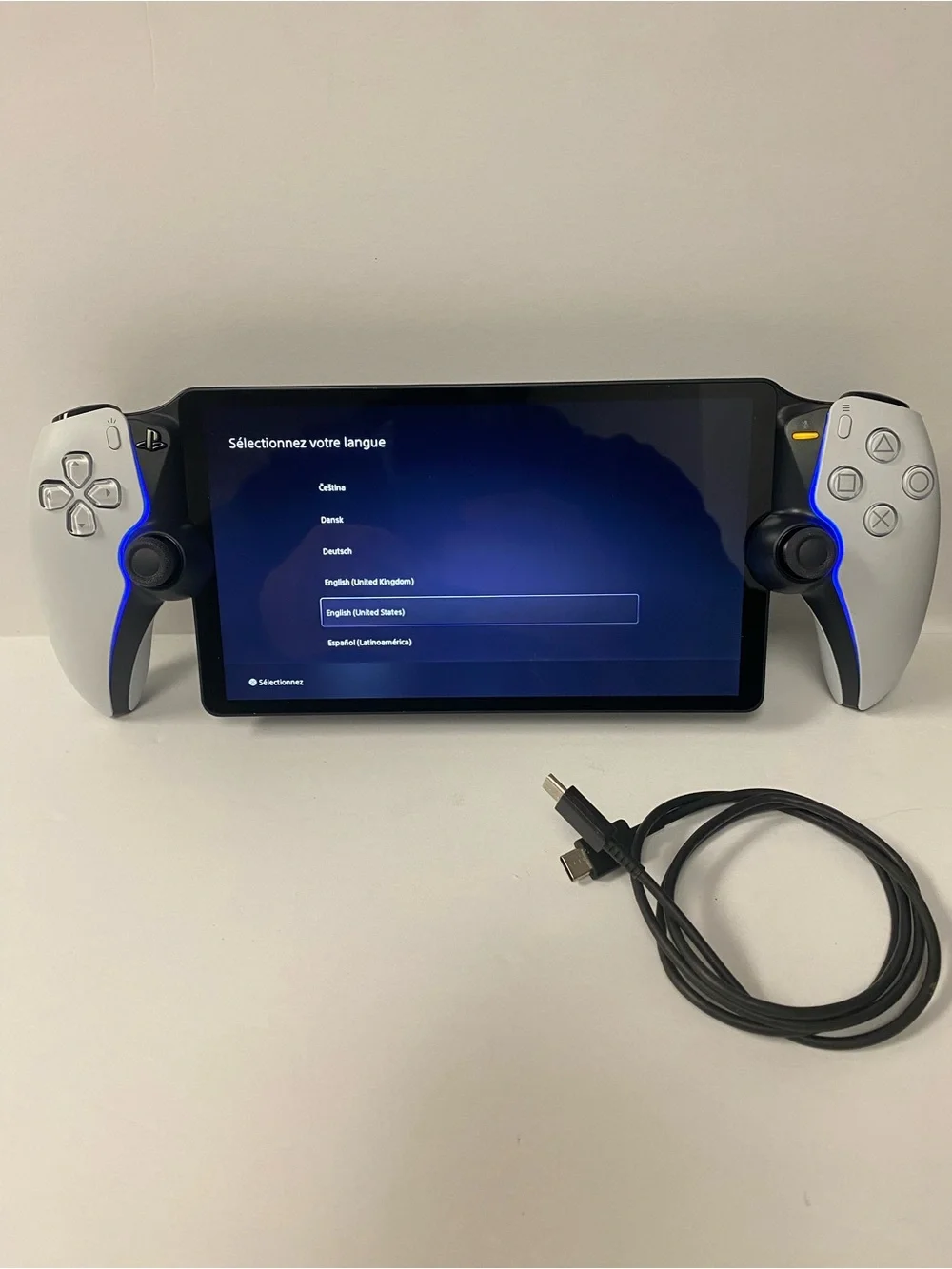 Sony PlayStation Portable-style Handheld with White Side Controllers